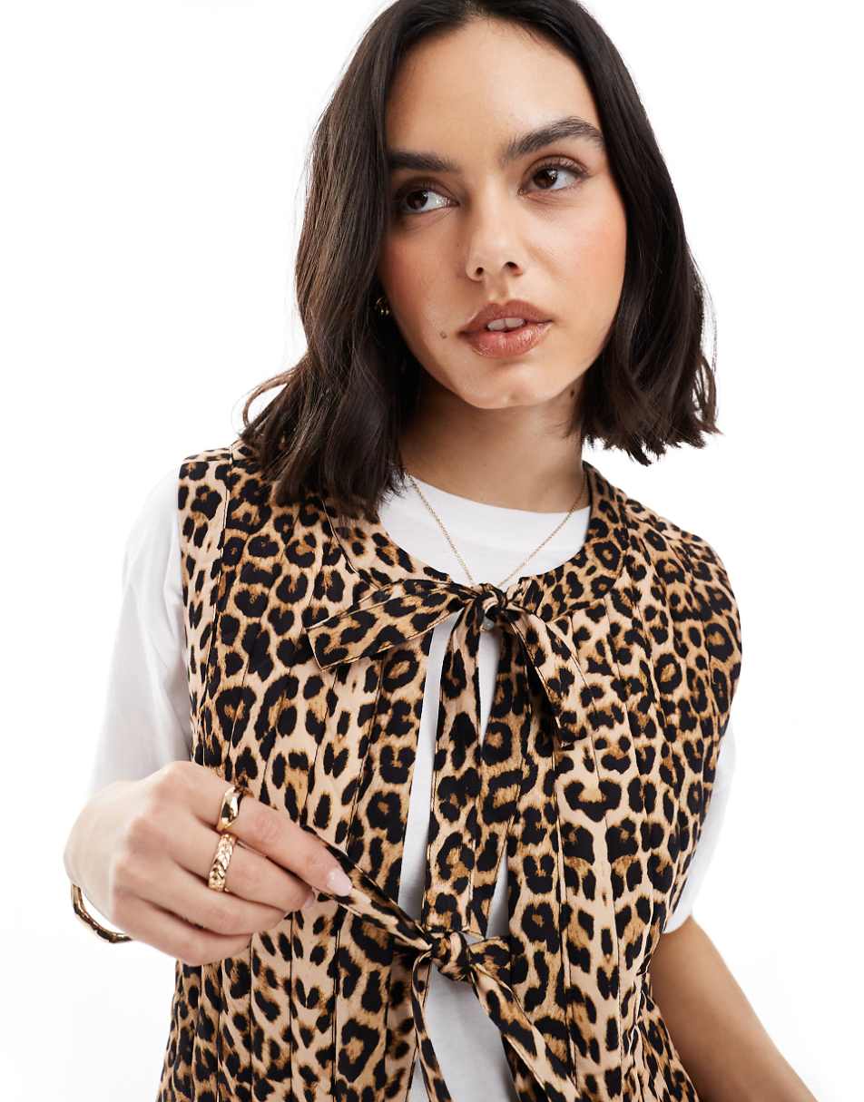 Gilet matelassé à détail noeud léopard
